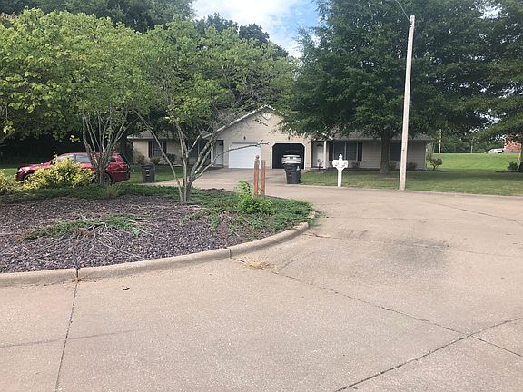 Front of residence, it is the one on the right.