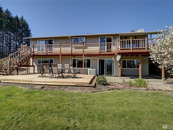 Large lower deck ready for outdoor dining and enjoying the amazing views.