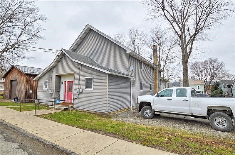 55 Beech St - 3 unit building with newer garage.