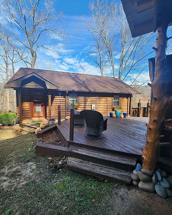 Log Cabin with 2400sqft Shop