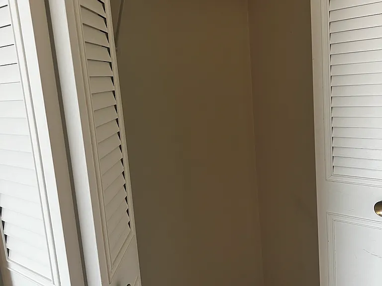 clothes closet interior, showing just a small section