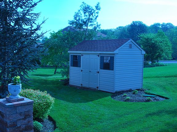 Shed matched house siding and roof