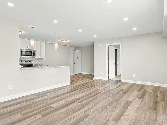 3 bedroom photo of living area