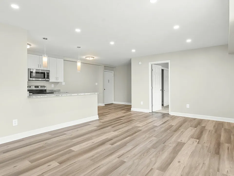 3 bedroom photo of living area