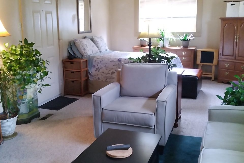 Enter through E Ohio Street door or back patio door. Idea for furnishing this open studio space.