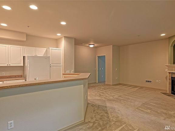 Open concept with living, dining and kitchen area.  