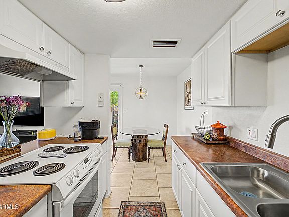 3rd image of 8857 N 12TH Place