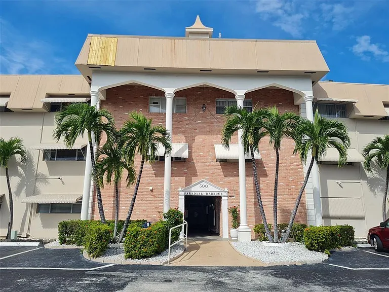 300 Golden Isles Dr #104 — Photo 2