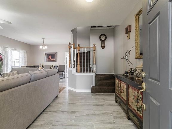 Upon entering your home, you will find the formal living room and dining room. Perfect to entertain.