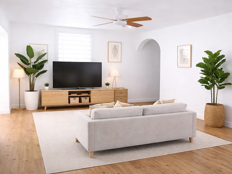 Inviting, staged living room with natural light, open layout, and comfortable modern design