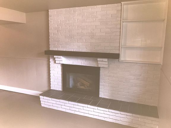 Sealed not functioning wood fireplace.