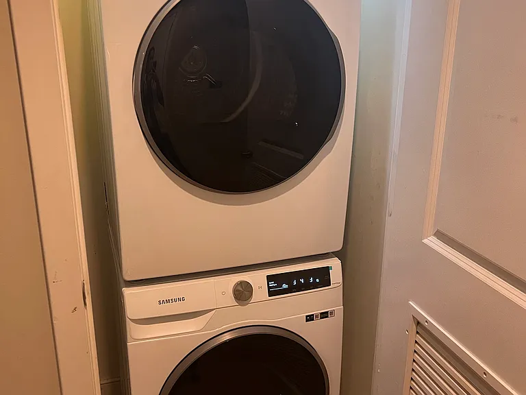 Washer dryer in unit near front door