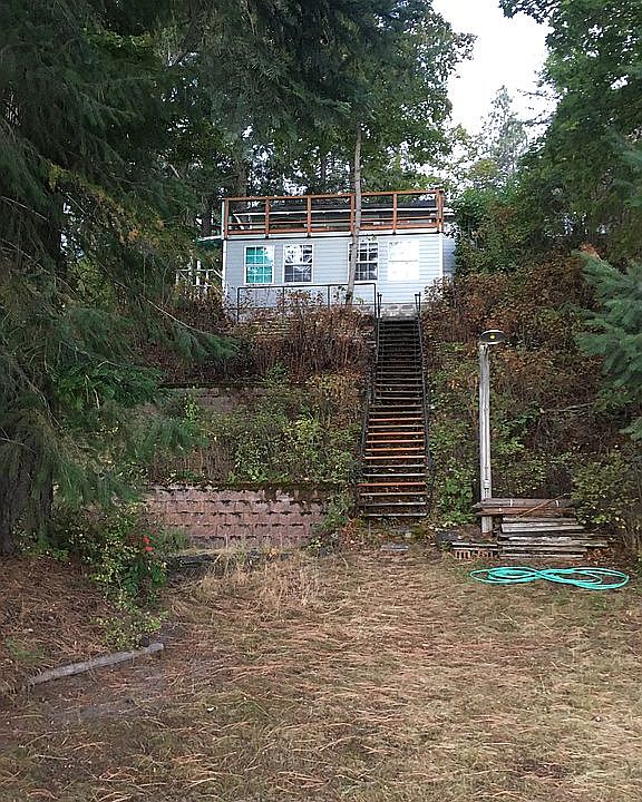 Cabin stairs from lake lawn.
