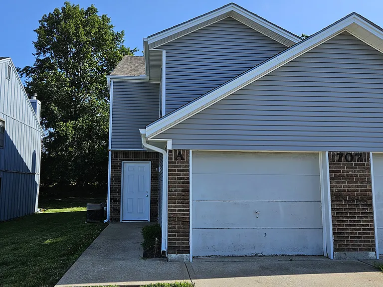 Front door and garage door with opener
