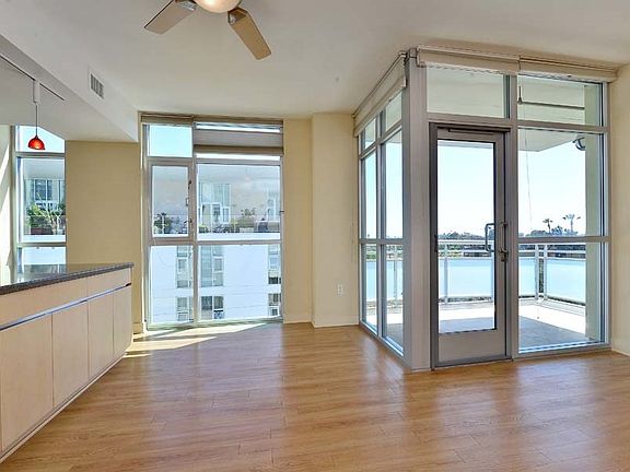 Access to the large corner balcony from the living area.