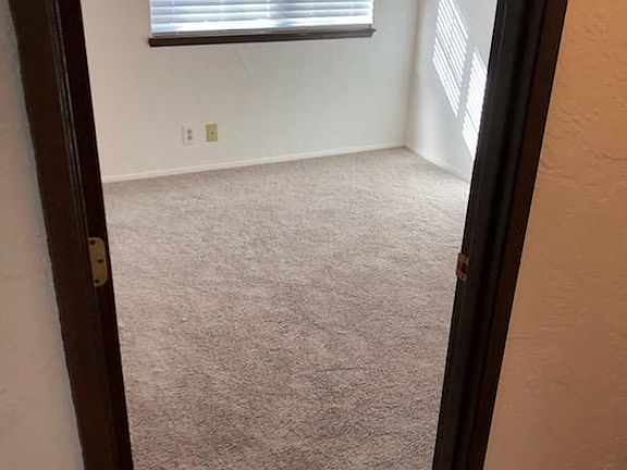 One of three bedrooms