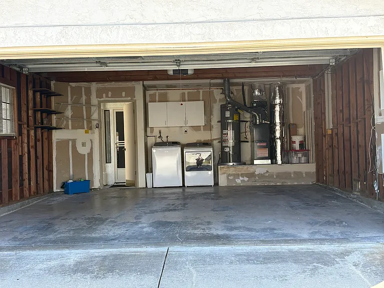Spacious garage with plenty of storage space.