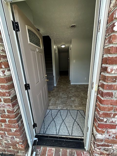 Brick Exterior with storm door