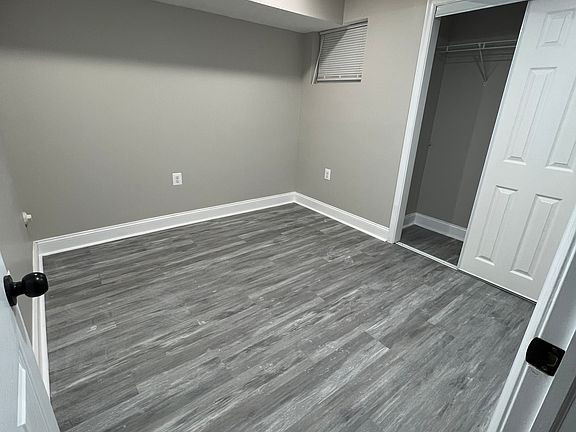 Apt A, Basement Level Bedroom 1 (Modern Grey interior, MORE photos coming soon)
