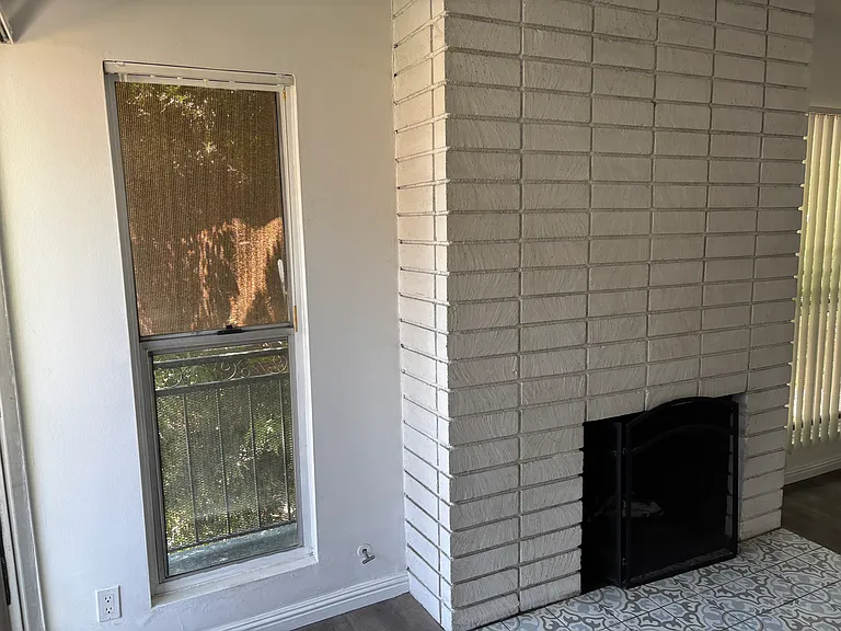 Living room area w working fireplace.