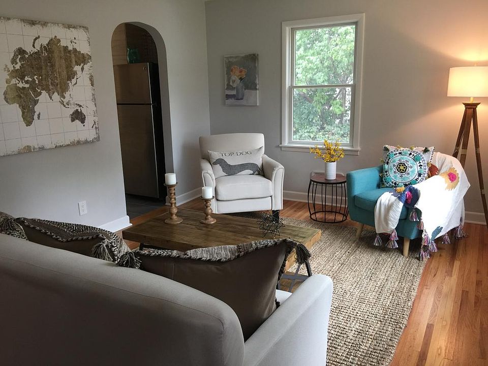 Bright freshly painted living room with beautiful hardwood f