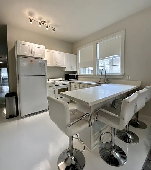 7625 Freret St — Photo 2