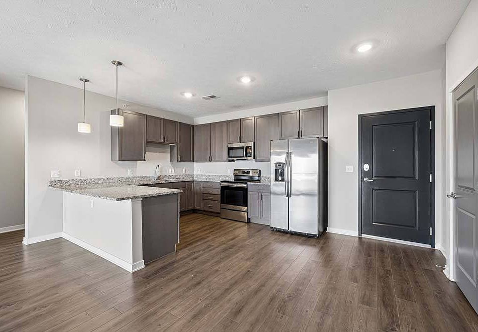 Contemporary finishes, generous prep space, and an open layout make this kitchen the perfect centerpiece for everyday living.