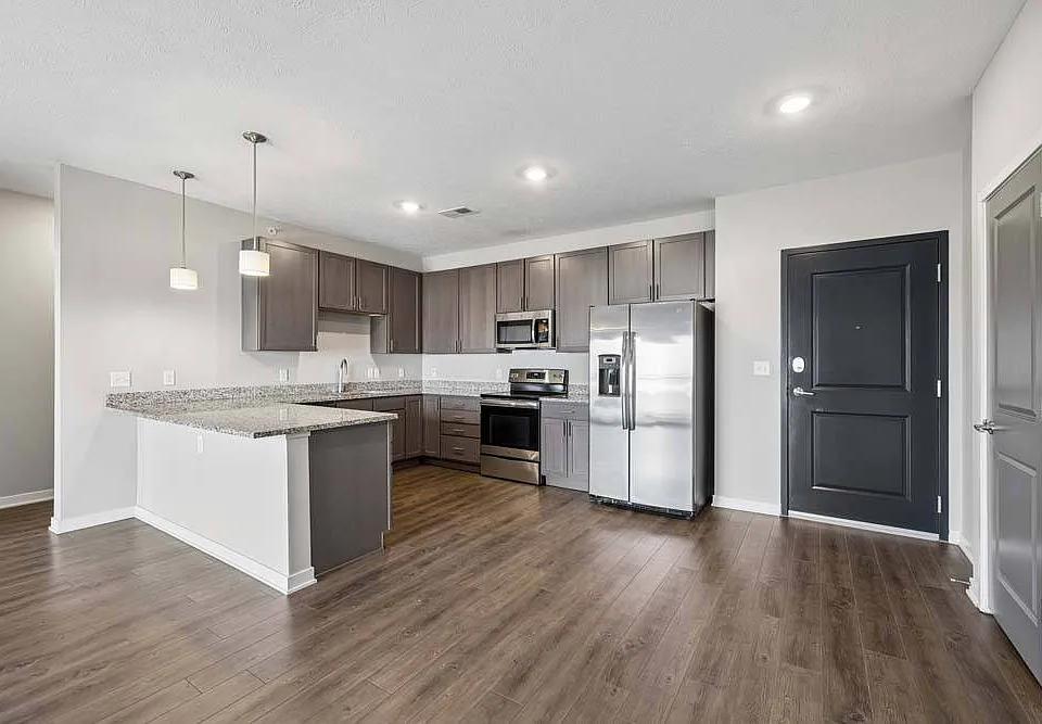 Contemporary finishes, generous prep space, and an open layout make this kitchen the perfect centerpiece for everyday living.