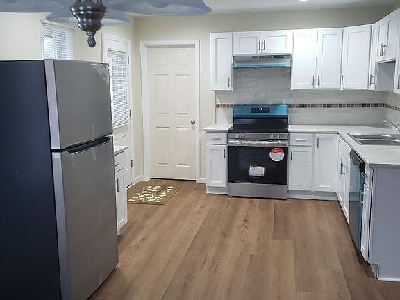 Kitchen open to dining room and living room