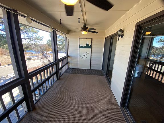 Screen enclosed balcony off the kitchen and living room level