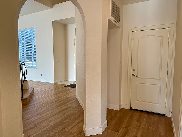Hallway and door to the garage