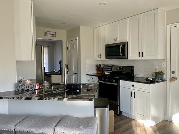 Kitchen with gas stove! Lots of cabinets and a large pantry!