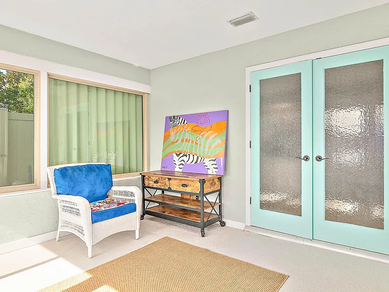 relaxing room connecting to Master bedroom and over looking Canal