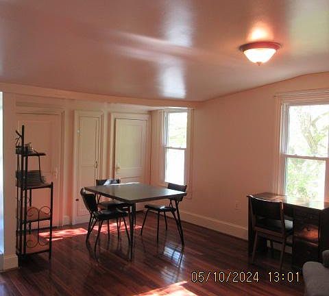 Eating area with 2 closets & broom storage.