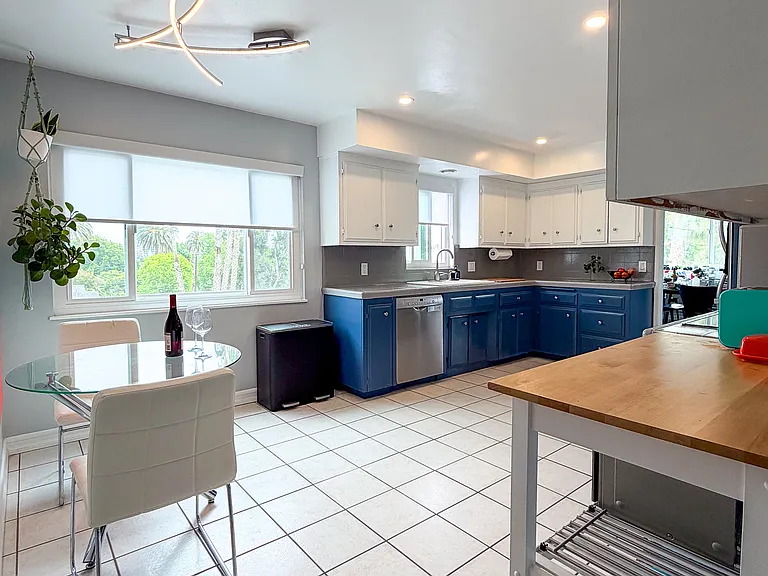 Spacious kitchen with abundant storage and natural light