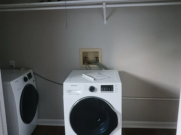 Washer and dryer in unit.