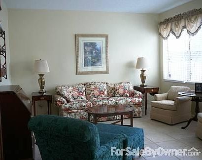 Large Open Living Room
						:
						With view of Pool/Lake, 9' ceilings on 1st floor, and 2-story double door entry