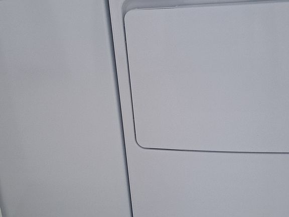 Full size washer and dryer in kitchen