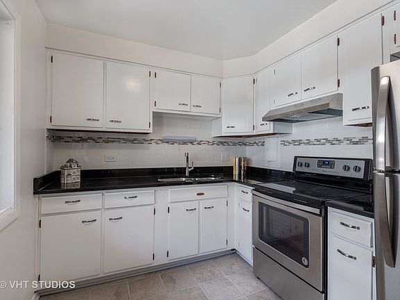4th image of 1545 W Chase Ave APT 208