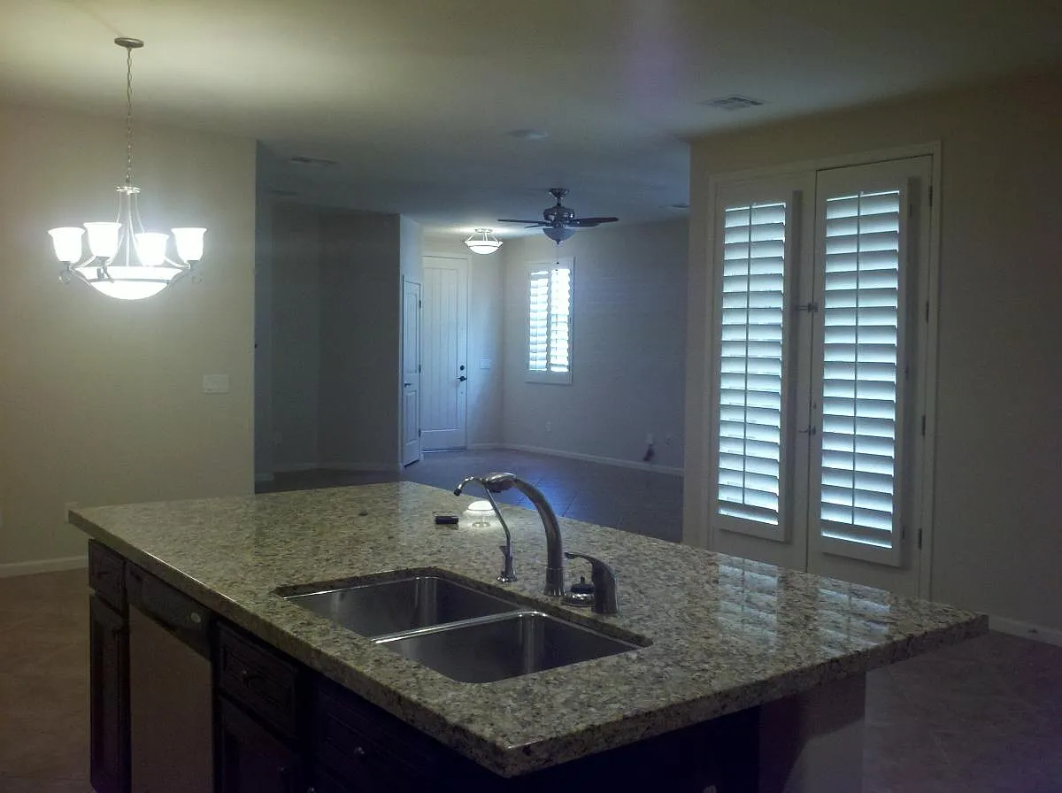 kitchen facing front door - 15363 W Columbine Dr