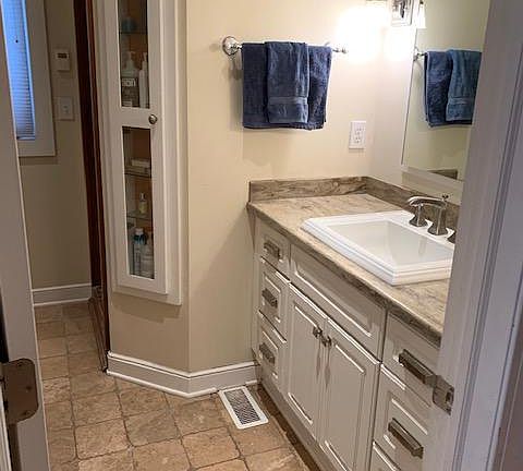 Upstairs bathroom with separate bath and shower