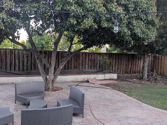 Large Backyard with automated sprinkler system