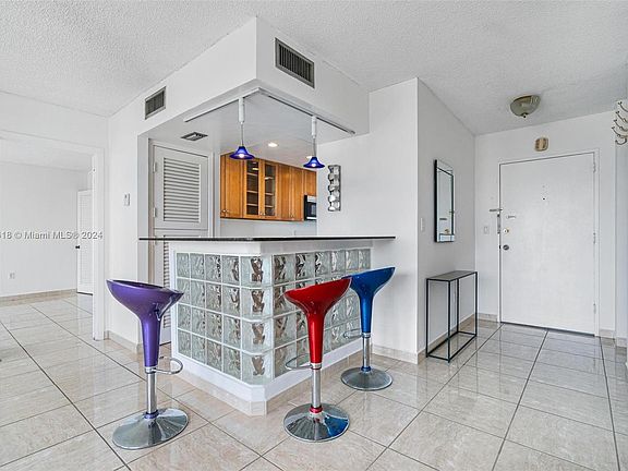 4th image of 9800 W Bay Harbor Dr APT 605