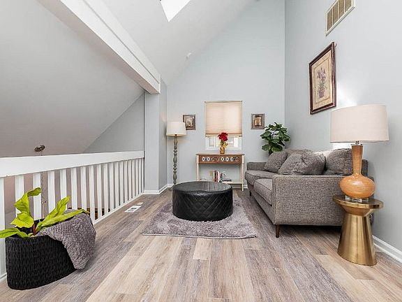loft overlooking downstairs into the main living space