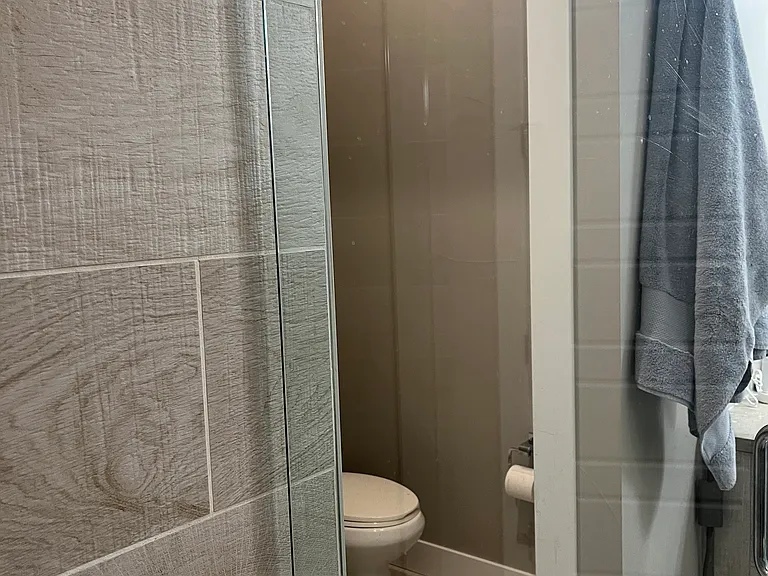 M Bathroom toilet enclosed for privacy