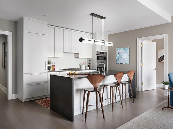 Kitchens feature Subzero built-in refrigerator, bottom mount freezer, Bosch Benchmark appliances inc