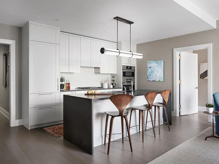 Kitchens feature Subzero built-in refrigerator, bottom mount freezer, Bosch Benchmark appliances inc