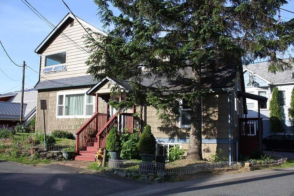 NW Elevation, window at lower right of house is into the apa