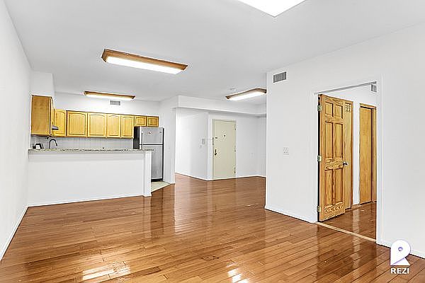 1st image of 65 Scholes St Floor 3