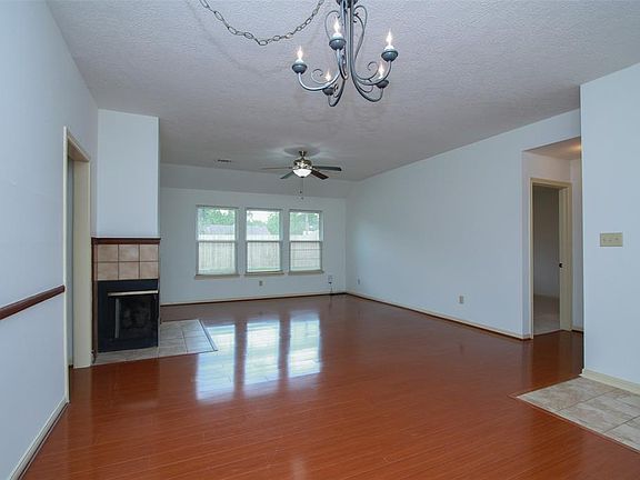 Open Living Room and Dining Room with fireplace to warm you and create lovely ambiance during holidays!